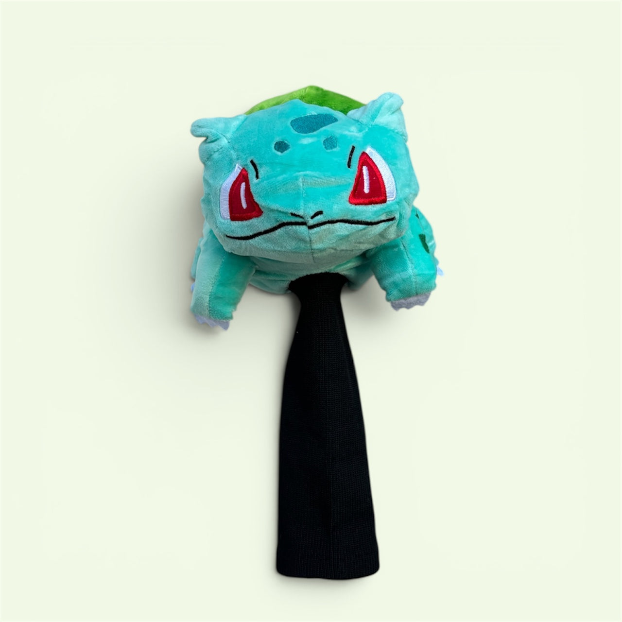 Bulbasaur headcover fitted to a rescue club head