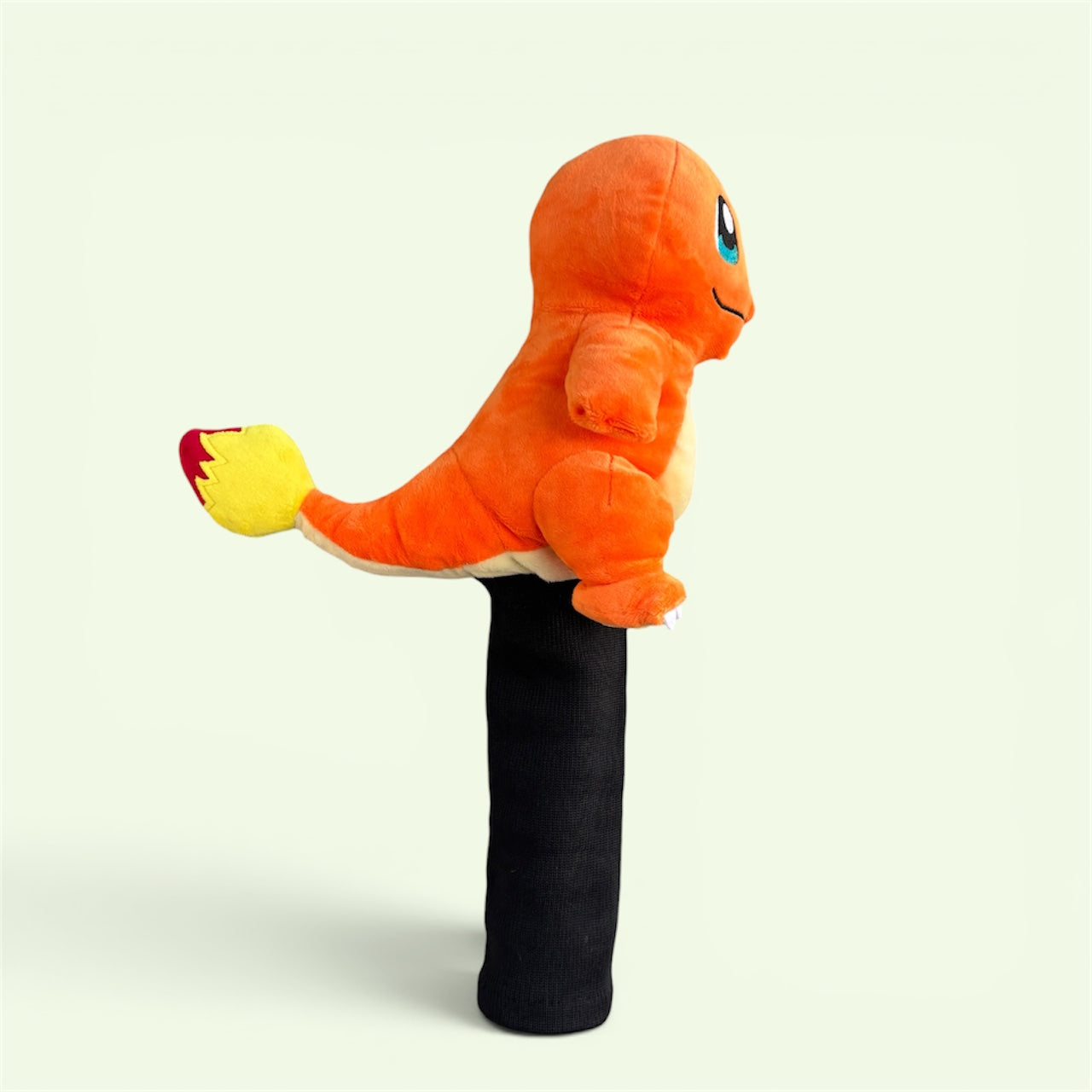 Charmander hybrid headcover fitted to a rescue club head
