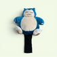 Snorlax golf head cover on a 460cc driver
